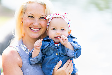 Image showing Young Caucasian Mother and Daughter At The Park