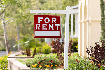 Image showing Red For Rent Real Estate Sign in Front House