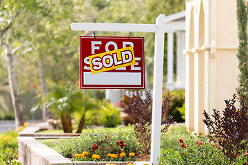 Image showing Sold Home For Sale Real Estate Sign in Front of New House