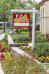 Image showing Sold Home For Sale Real Estate Sign in Front of New House