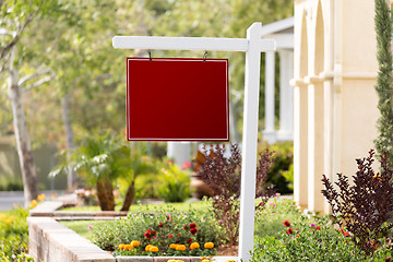 Image showing Blank Sale Real Estate Sign in Front of House