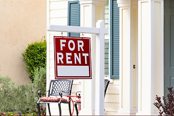 Image showing Red For Rent Real Estate Sign in Front House