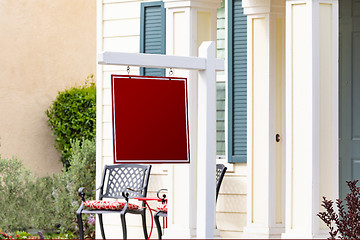 Image showing Blank Sale Real Estate Sign in Front of House