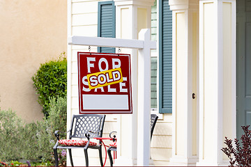 Image showing Sold Home For Sale Real Estate Sign in Front of New House