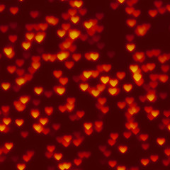 Image showing glowing hearts bokeh red seamless background