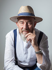 Image showing senior male portrait with a straw hat