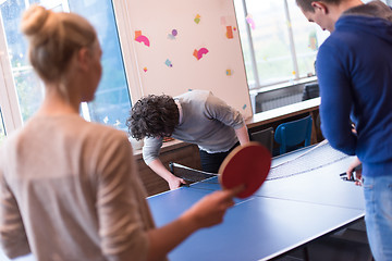 Image showing startup business team playing ping pong tennis