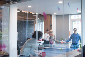 Image showing startup business team playing ping pong tennis