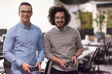 Image showing startup Office Workers Playing computer games