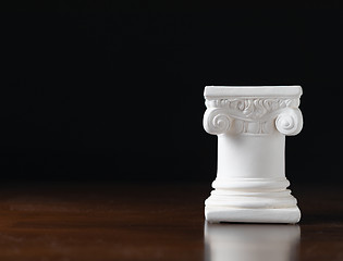 Image showing White Ionic Design Column on Dark Background