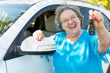 Image showing Happy Senior Woman With New Car and Keys