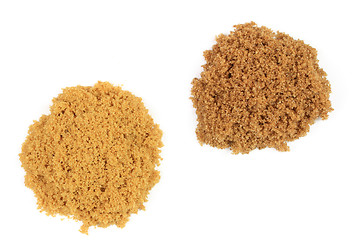 Image showing Two types brown sugar on pails. 