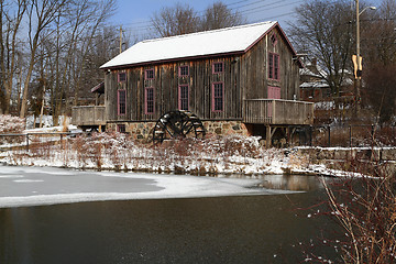 Image showing General view Old water mill in winter.