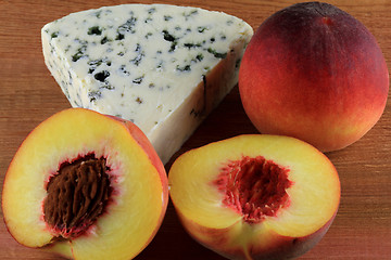 Image showing Blue Cheese served with Cut Peaches. 