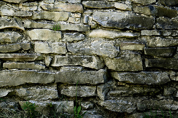 Image showing Wall built from stone plates in 1875 