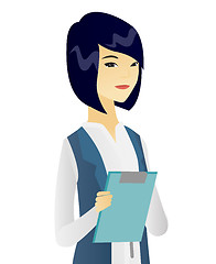 Image showing Asian female office worker holding a clipboard.