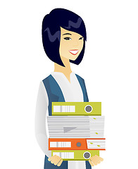 Image showing Young asian business woman holding pile of folders