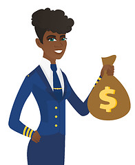 Image showing Arican-american stewardess holding a money bag.