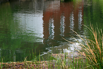 Image showing Reflection in the water of very old Building. 