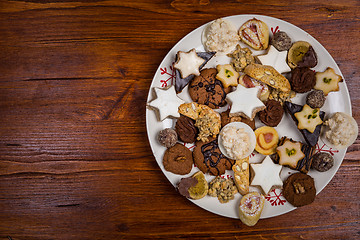 Image showing Assorted Christmas cookies on wooden table