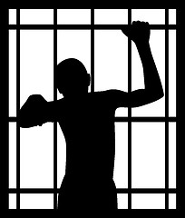 Image showing Man in prison behind bars