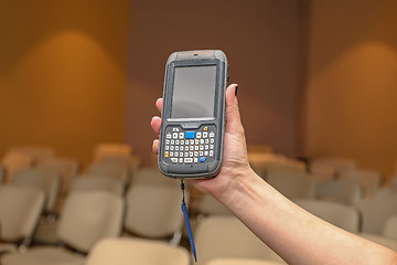 Image showing Woman Holding Portable Computer