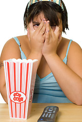 Image showing Girl Watching Scary Movie