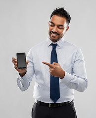 Image showing indian businessman with smartphone