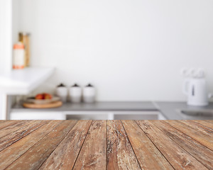 Image showing blurred kitchen background with wooden boards