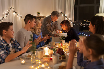 Image showing happy family having birthday party at home