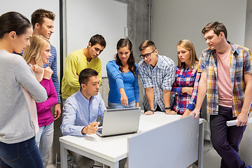 Image showing students and teacher with laptop at school