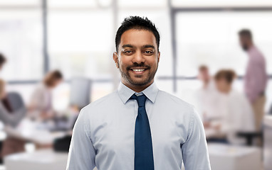 Image showing indian businessman in shirt with tie over office