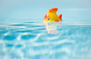 Image showing Red toy Fish in swimming pool