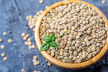 Image showing Brown organic dried lentils close up.