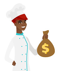 Image showing Young african-american chef holding a money bag.