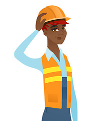 Image showing Young african-american builder scratching head.