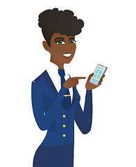 Image showing Arican-american stewardess holding a mobile phone.