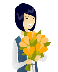 Image showing Asian business woman holding bouquet of flowers.