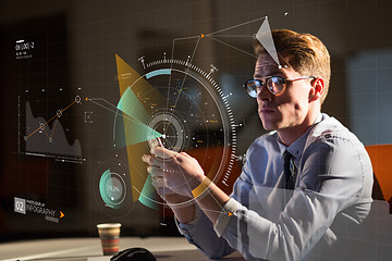 Image showing man using mobile phone in dark office