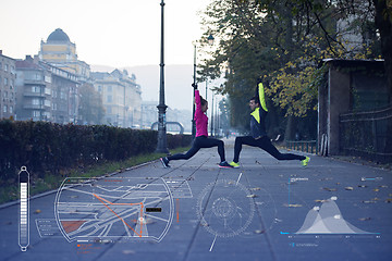 Image showing Man and woman stretching on the street