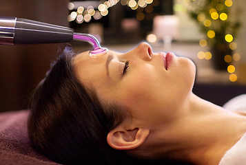 Image showing woman having hydradermie facial treatment in spa