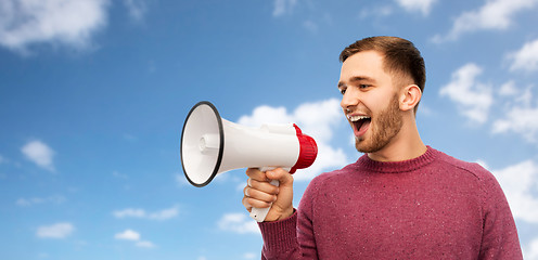 Image showing smiling man with megaphone