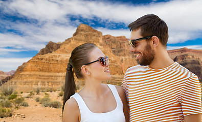 Image showing happy couple in sunglasses outdoors in summer