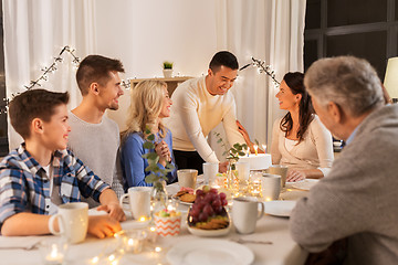 Image showing happy family having birthday party at home