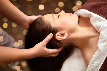 Image showing woman having head massage at spa