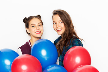 Image showing happy teenage girls with helium balloons