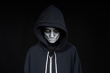 Image showing Boy with Halloween zombie makeup with hood on l