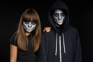 Image showing Boy with Halloween zombie makeup with hood on l