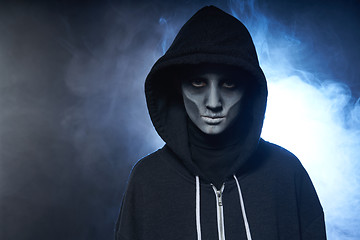 Image showing Boy with Halloween zombie makeup with hood on