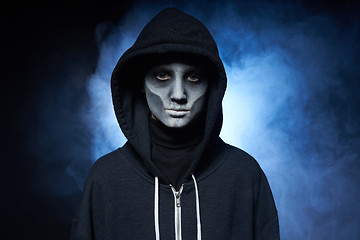 Image showing Boy with Halloween zombie makeup with hood on